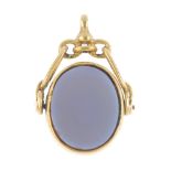 An early 20th century 18ct gold hardstone swivel fob. The rotating oval-shape sardonyx fob, to the