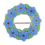 A H DARBY & SON - a 1940s silver enamel brooch. Designed as a wreath of blue enamel flowers with