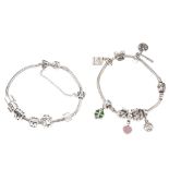 PANDORA - two charm bracelets. The two snake chains with a total of twelve Pandora charms