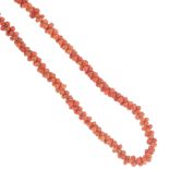 Three coral necklaces. The first comprising interlocking barbell shape beads, to the screw clasp,