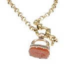 A carnelian intaglio fob with chain. The intaglio carved to depict a clover, to the 9ct gold belcher