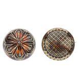 Two late 19th century tortoiseshell pique brooches. Both of domed circular shape, the first with