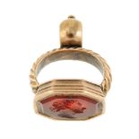 A carnelian intaglio fob. The octagonal carnelian with intaglio carved image of a man with a plaited