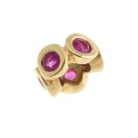 PANDORA - a gold charm. The spacer charm, collet-set with five rubies around its circumference. With