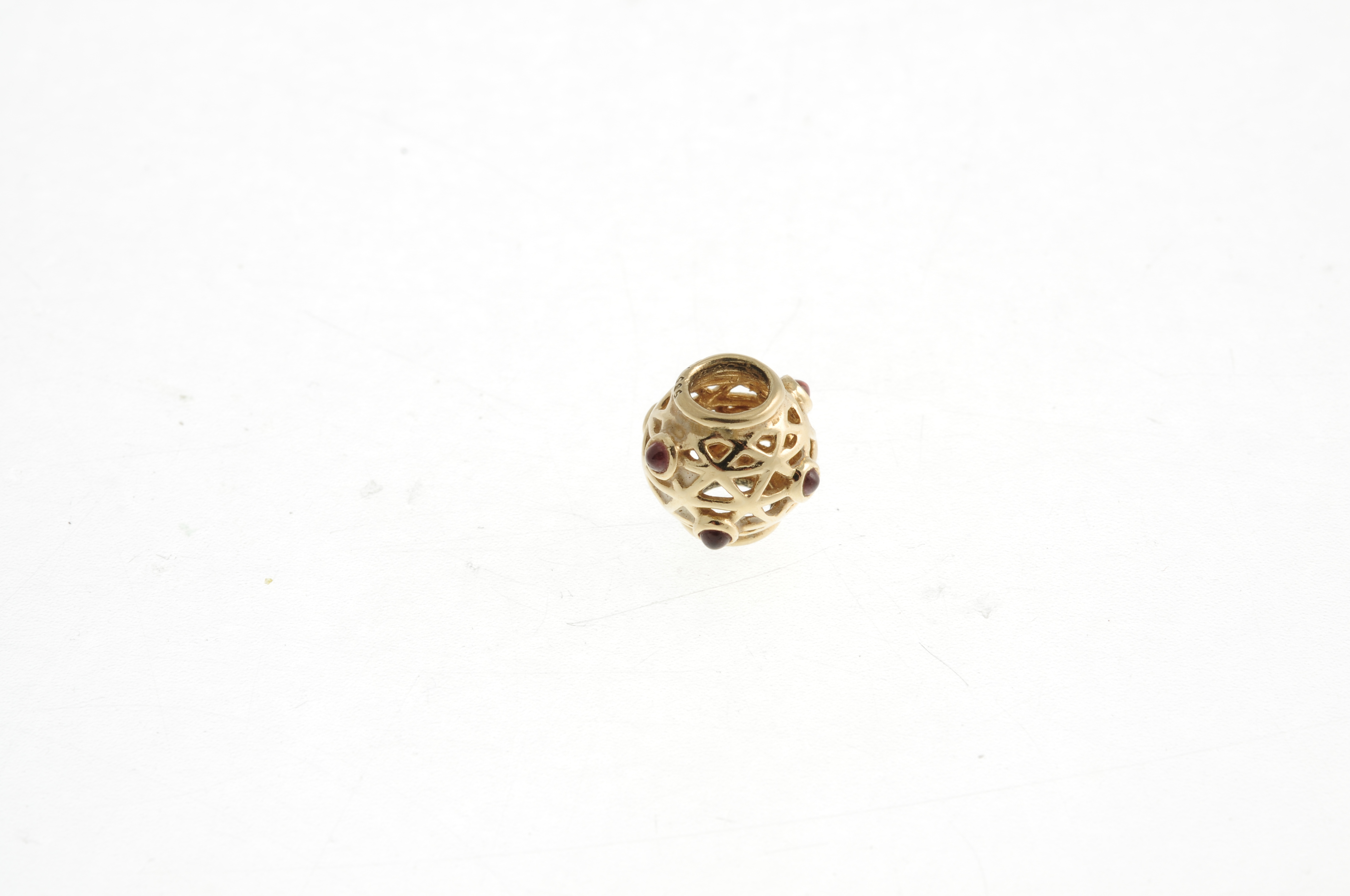 PANDORA - a gold charm. Designed as a spherical bead with intersecting diagonal lines and circular - Image 2 of 2