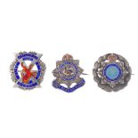 A selection mainly enamel military brooches. To include an RAF brooch with blue enamel wings and a