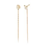 A selection of pearl stickpins. Seven set with single cultured pearls, the eighth with a branch