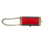 A silver and enamel minaudiere. Of rectangular shape with chamfered edges, the front and back