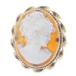 A 9ct gold cameo brooch. The carved cameo depicting a lady in profile, to the rope-twist surround.