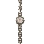 A marcasite watch. Designed as a circular mother-of-pearl dial, with scrolling marcasite-set