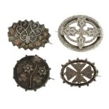 A selection of late 19th to early 20th century silver brooches. To include four name badges, for