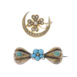 Two brooches. The first designed as a crescent moon with a four leaf clover to its inner curve,