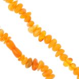 A natural amber bead necklace. The polished freeform natural amber beads measuring 0.8 to 1.2cms.