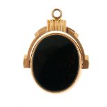 A 9ct gold swivel fob. Of oval outline, with bloodstone set to one side and carnelian to the