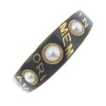 A late 19th century gold split pearl and enamel ring. The three split pearls and black enamel,