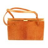 MAPPIN & WEBB - a mid 20th century handbag. The structured hinge framed tan lizard skin, with double