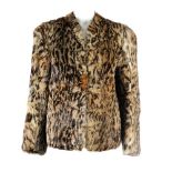 A collarless ocelot stencilled coney fur jacket. Featuring hook and eye fastenings and two