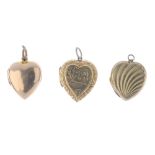 Three 9ct gold front and back lockets. All of heart-shape outline, one plain, one with engraved