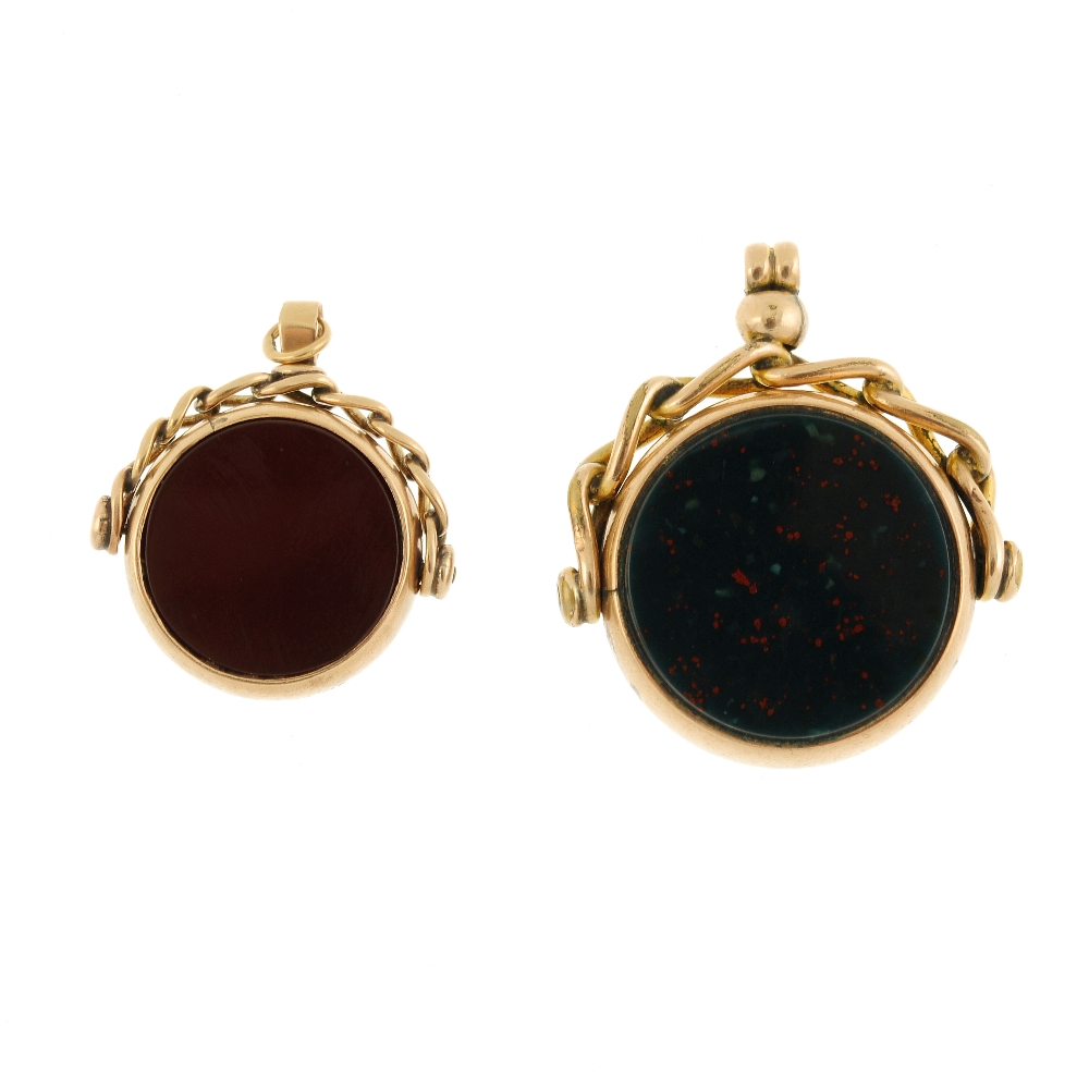 Two 9ct gold swivel fobs. Both set with carnelian and bloodstone, with curb-link pedestals. With
