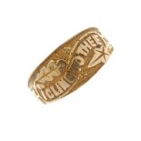 A late Victorian gold memorial ring. Designed as a tapered band, embossed with the words 'I Cling to