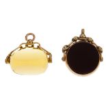 Two 9ct gold swivel fobs. The first of circular outline, collet-set with carnelian to one side and