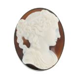A carved sardonyx loose cameo. The oval panel with black background, with a carved profile of a