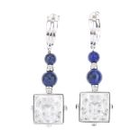 LALIQUE - a pair of earrings. Designed as semi-circular hoops, with two spherical lapis lazuli