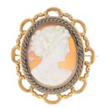 A cameo brooch. The oval shape cameo depicting a classic lady in profile, to the rope-twist border