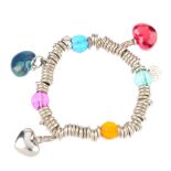 Three items of designer jewellery. The first, a Sweetie bracelet set with faceted vari-colour