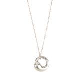 TIFFANY & CO. - an Elsa Peretti pendant. Designed as a graduated circle suspended from a fine