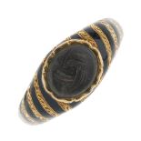 A mid Victorian 18ct gold enamel memorial ring. The tapered band with alternating diagonal black