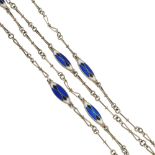 An early 20th century silver and enamel necklace. A long-length necklace, designed as a fancy-link