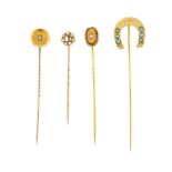 Four early 20th century stickpins. One designed as a horseshoe set with six circular turquoise