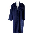 YVES SAINT LAURENT - a navy woolen coat. Featuring a notched collar and two external pockets.