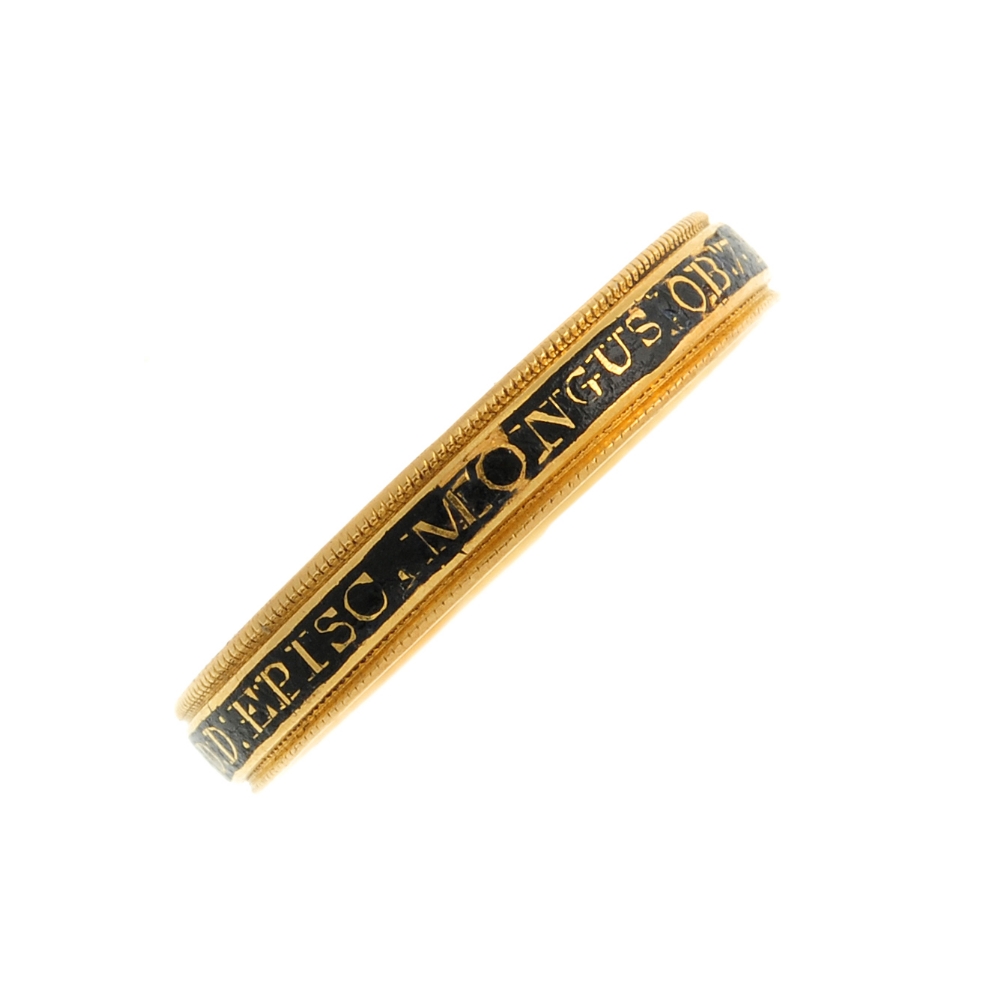 A George III gold enamel memorial ring. The black enamel band with gold lettering around its