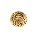 PANDORA - a gold charm. The circular bead shape charm, with curl patterns. With maker's mark.