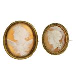 Four cameo brooches. All of oval outline, the first with a cannetille border to the shell carved