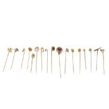 A selection of stickpins. To include one set with an oval pink paste, with coiled snake-like