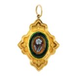 A late Victorian gold pendant. The diamond-shape gold-tone panel with central oval-shape green