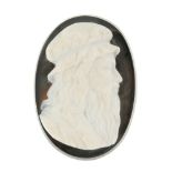 A carved sardonyx loose cameo. Of oval shape, carved to depict the profile of a bearded man