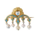 A set of early 20th century enamel and imitation pearl jewellery. The brooch designed as a blue