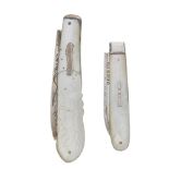 A Georgian and Victorian silver and mother-of-pearl penknives. The larger with engraved fruit to the