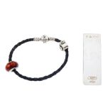 Three designer items. To include a Pandora leather bracelet of black plaited leather with a wooden