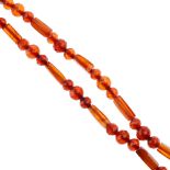 Two plastic bead necklaces. To include a faceted bead necklace with rectangular prism spacers and