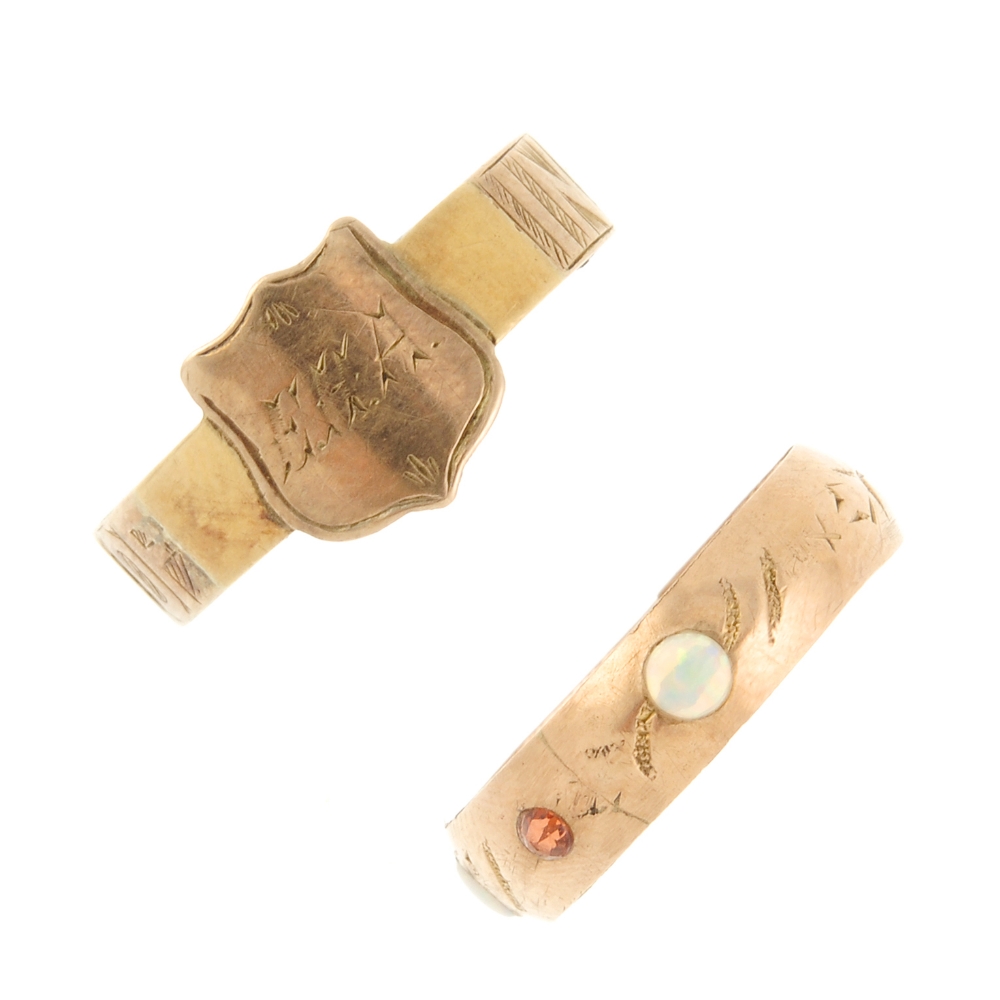 Two late Victorian 9ct gold rings. The first a memorial ring, with a monogram engraved shield-