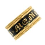 A George IV 18ct gold enamel memorial ring. With knurled edging, the black enamel with gold