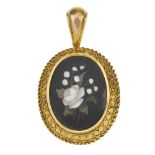 A late Victorian pietra dura pendant, circa 1890. The black hardstone panel inlaid with vari-