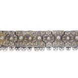 A late 19th century Russian silver choker. Each link embossed with abstract foliate designs, with