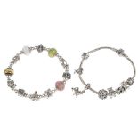 PANDORA - a charm bracelet and further charms. The Pandora bracelet with six Pandora charms,