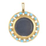 A late Victorian gold and turquoise photograph locket. Of openwork design, the glazed disc, with